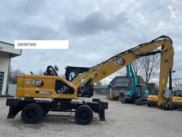 Skovel Caterpillar MH 3024 MIETE / RENTAL...