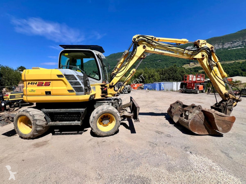 Excavator New Holland PELLE A PNEUS 10T 26