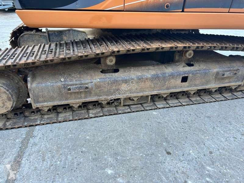 Escavadora Case