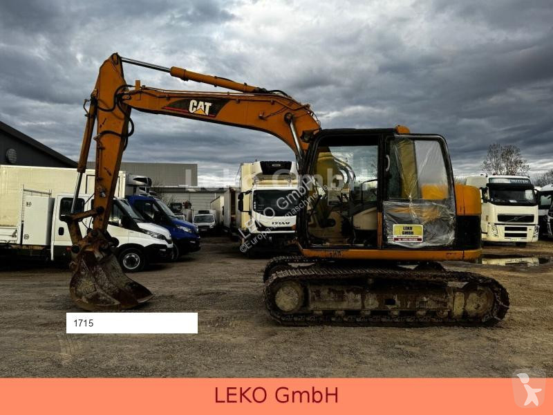 Lopatový nakládač Caterpillar 311C Mit Zwei...