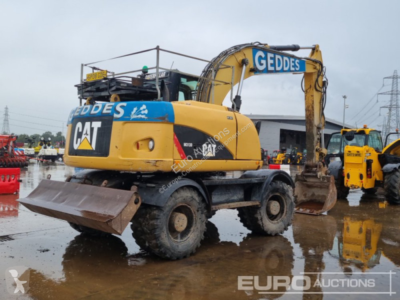 Lopatový nakládač Caterpillar D
