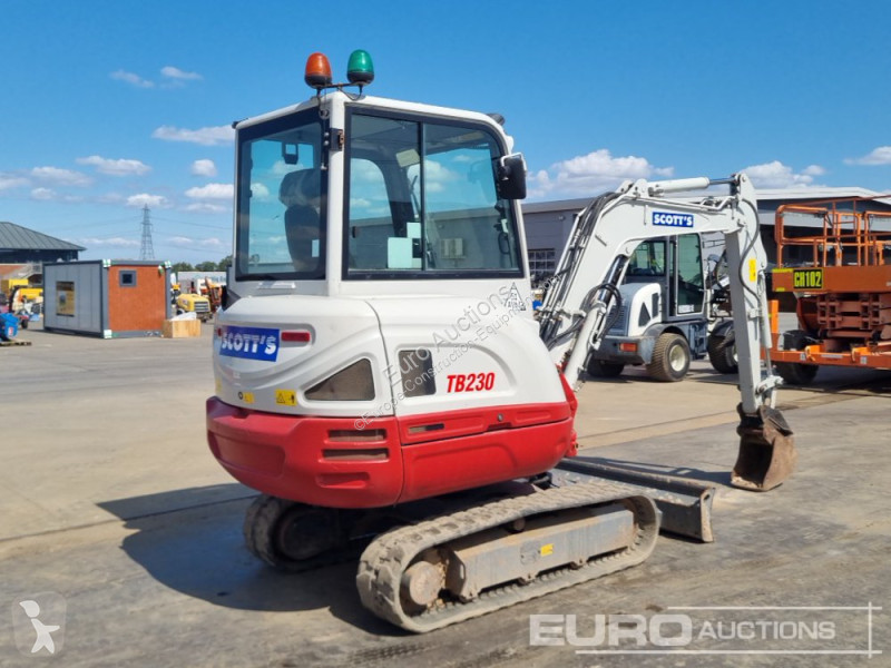 Escavadora Takeuchi 0