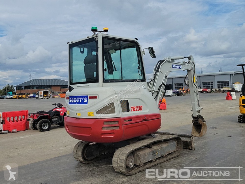 Escavadora Takeuchi 0
