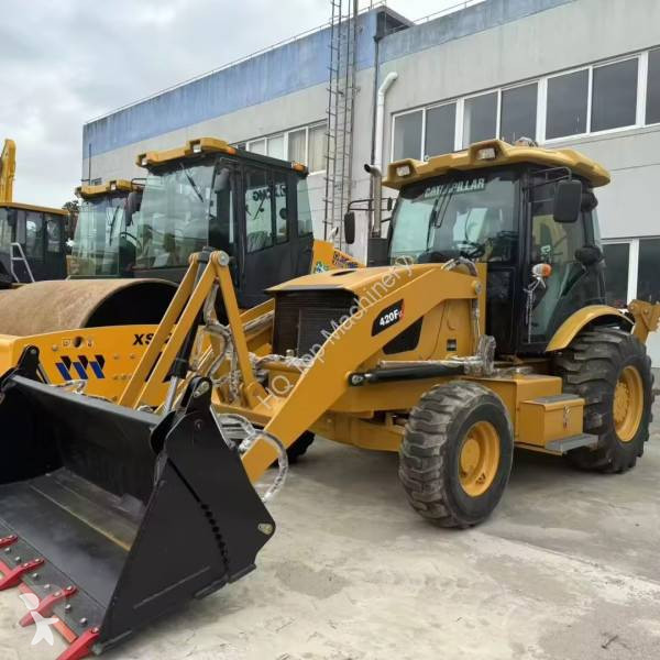 Traktor med grab Caterpillar CAT420F CAT430F...