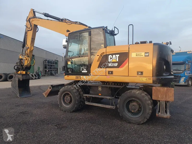 Rýpadlo Caterpillar F - mobile excavator -...