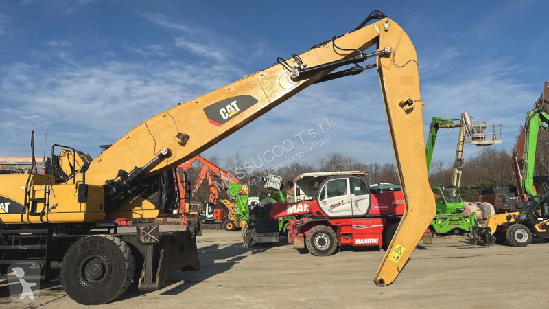 Rýpadlo Caterpillar M 4X4