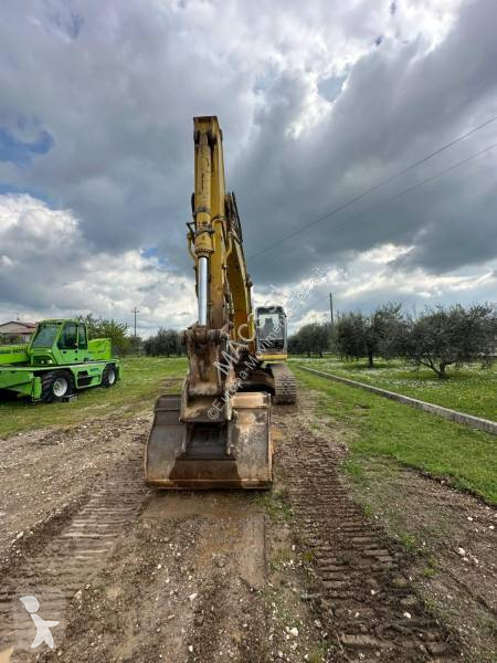 Rýpadlo New Holland 305