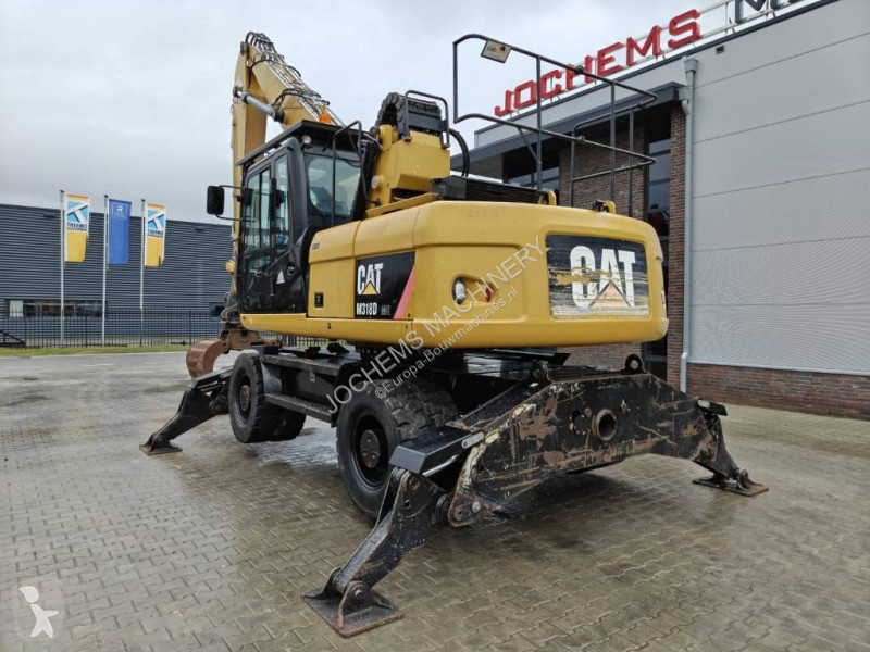 Escavatore Caterpillar M 318 D MH + GRAB