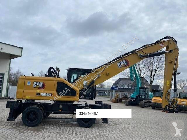 جرافة Caterpillar MH 3024 MIETE / RENTAL...