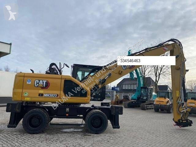 جرافة Caterpillar MH 3022 MIETE / RENTAL...