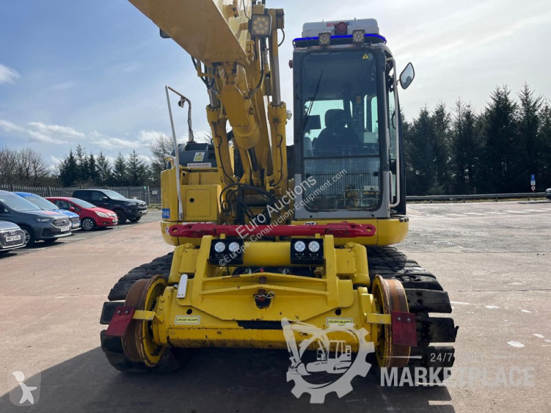 Екскаватор Komatsu 138US2