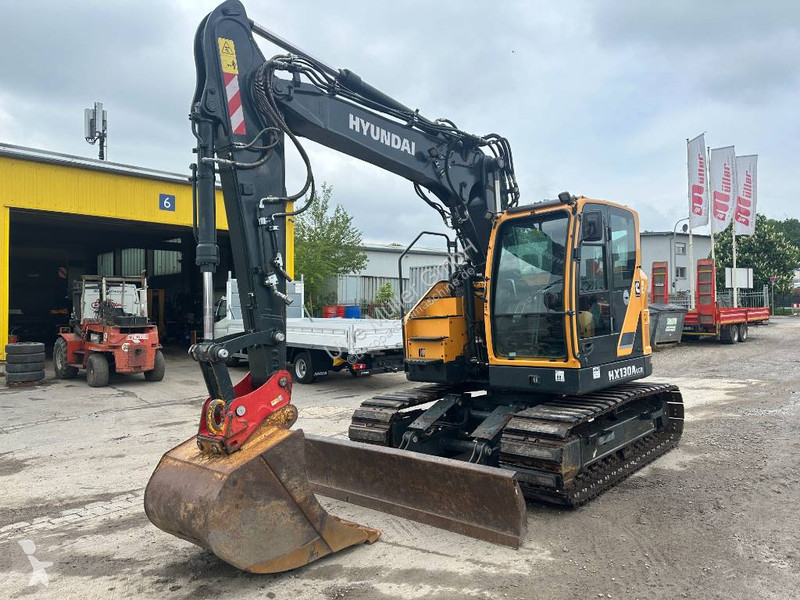 جرافة Hyundai HX 130 ALCR Kettenbagger 76.000...