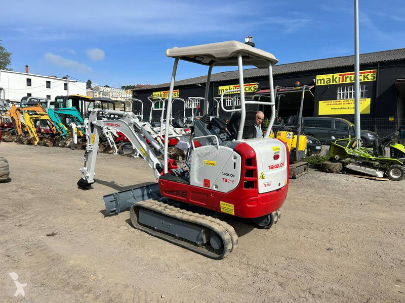 جرافة Takeuchi tb216