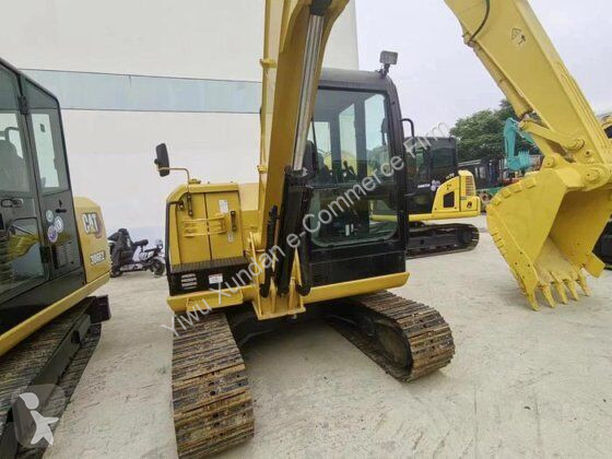 Экскаватор Caterpillar 305