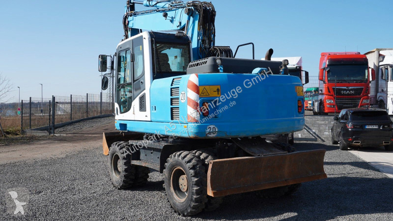 جرافة Komatsu Mobilbagger Verstellausleger HS21