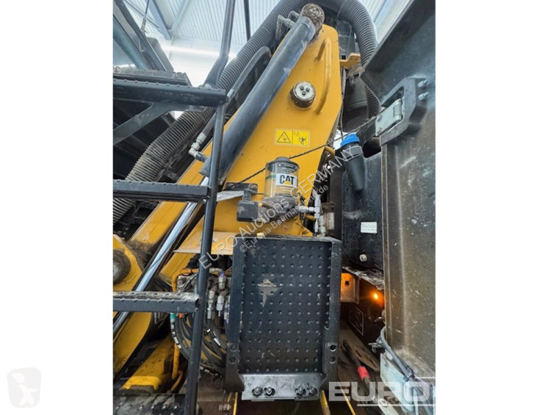 Багер Caterpillar MH3024