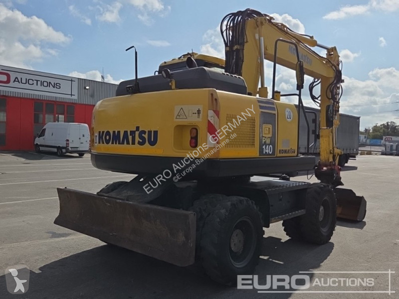 Багер Komatsu