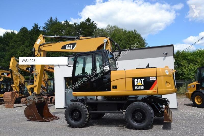 Lopatový nakládač Caterpillar 318 D
