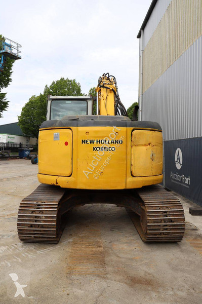 Багер New Holland Kobelco 2