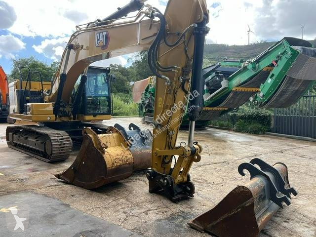 Багер Caterpillar 323