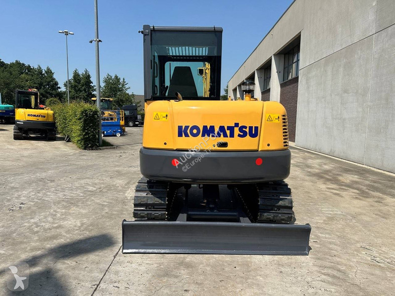 Екскаватор Komatsu 7