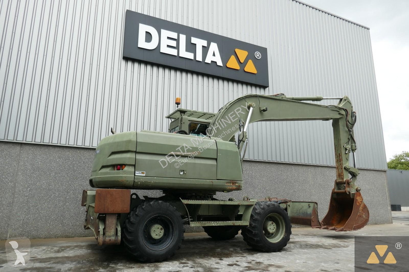 Koparka Caterpillar Ex-army