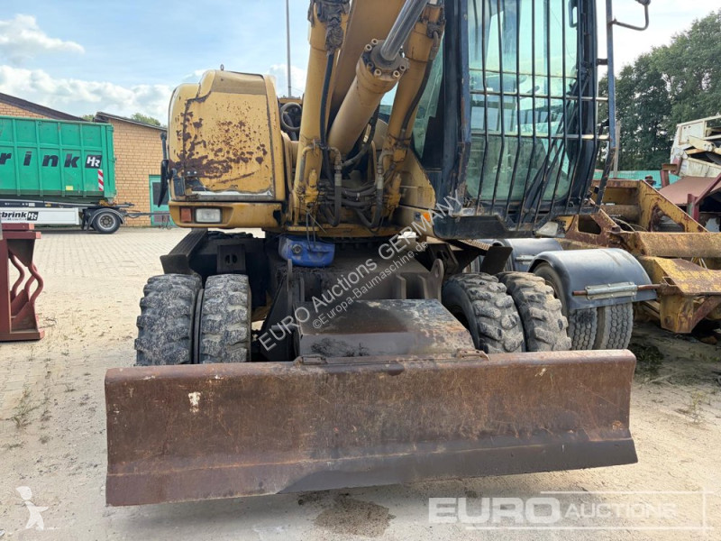 Багер Caterpillar