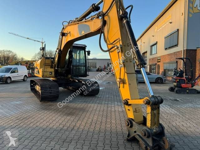 Багер Caterpillar L