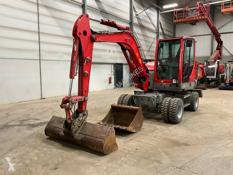Багер Neuson EW 65