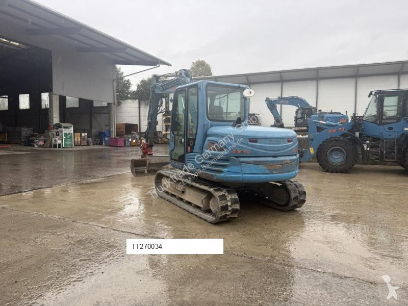 جرافة Takeuchi Powertilt