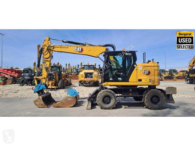 Багер Caterpillar