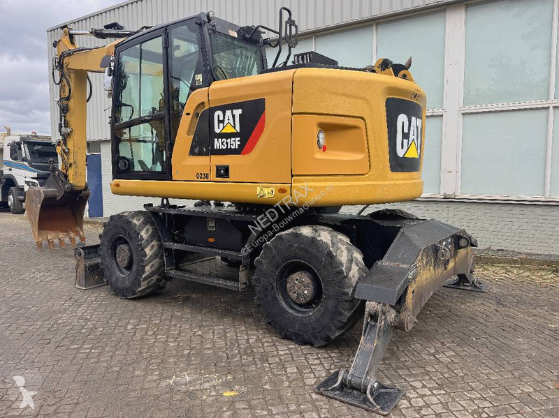 Багер Caterpillar F 2017