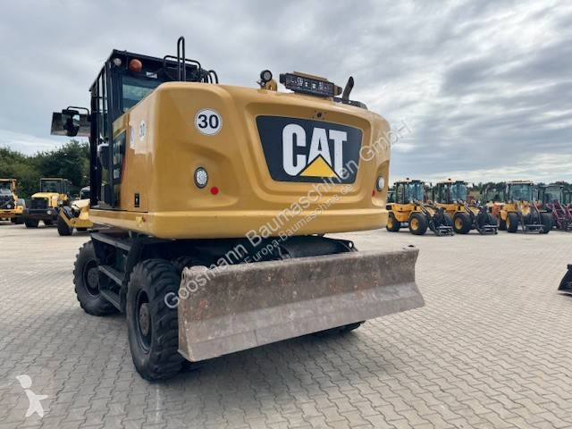 Багер Caterpillar F