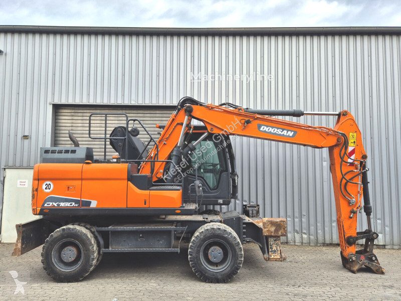 Багер Doosan 5
