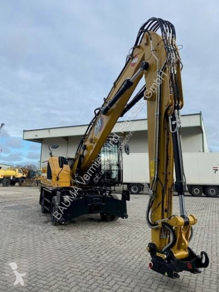 Graafmachine Caterpillar MH 3022 MIETE / RENTAL...