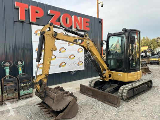 Lopatový nakládač Caterpillar 303.5ecr à 28500...