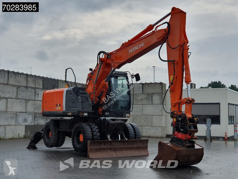 Escavadora Hitachi ZX140W -3 OUTRIGGERS - ROTOTILT