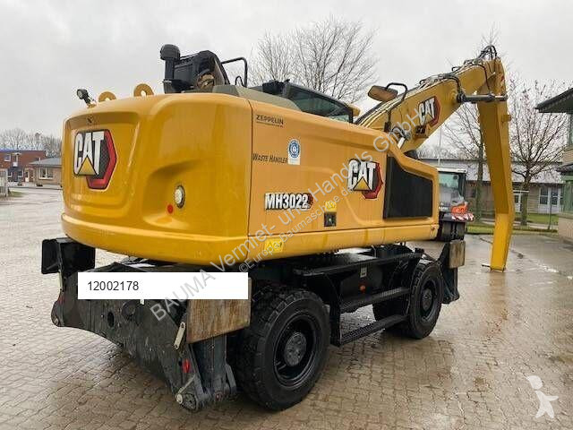 Skovel Caterpillar MH 3022 IND MIETE / RENTAL...