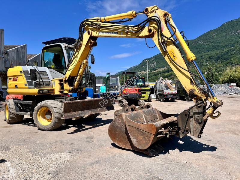 Excavator New Holland PELLE A PNEUS 10T 26