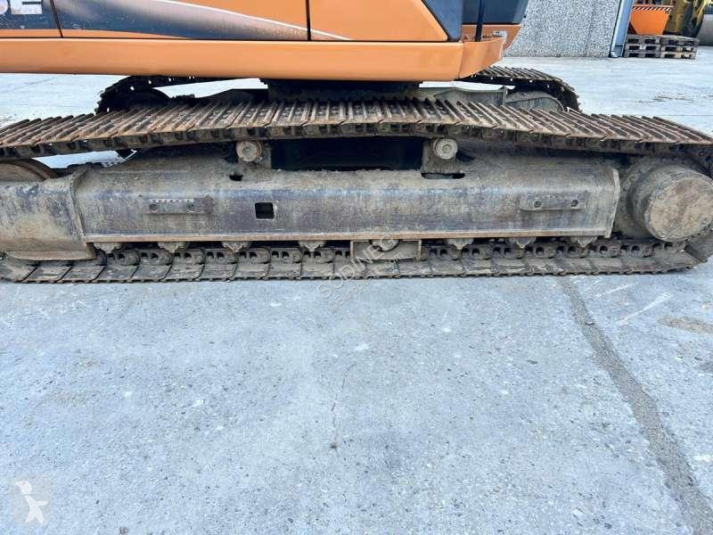 Escavadora Case