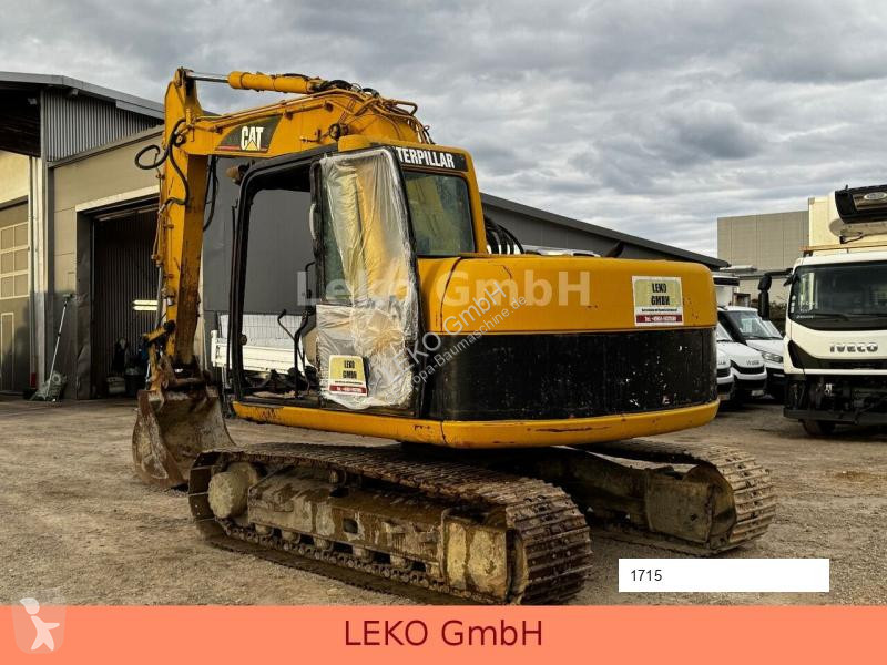 Lopatový nakládač Caterpillar 311C Mit Zwei...