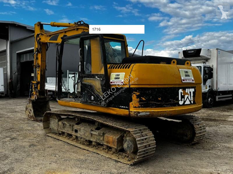 Escavatore Caterpillar C Mit Zwei Löffeln