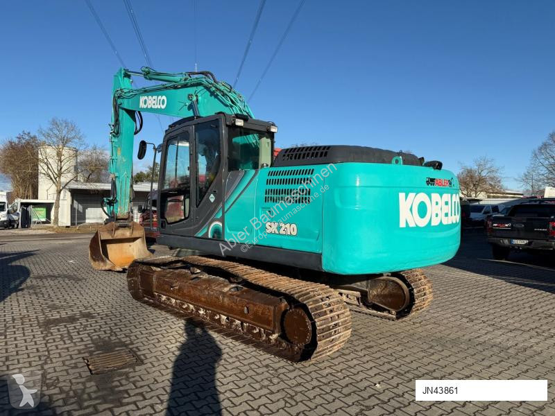 Excavadora Kobelco SK210 NLC-10 OQ70 180 Grad...