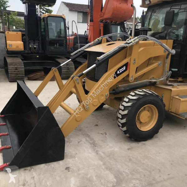 Traktor med grab Caterpillar CAT420F CAT430F...