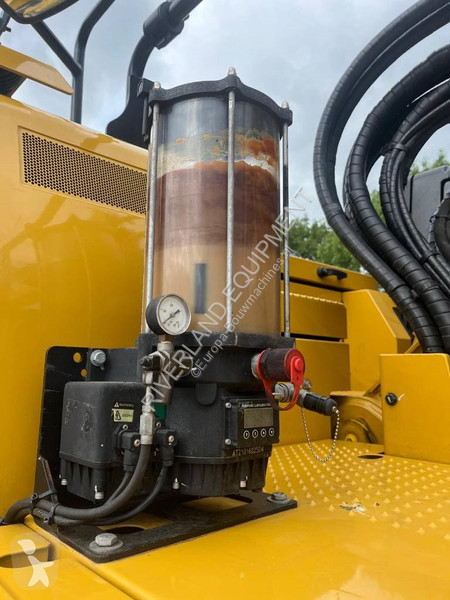 Rýpadlo Caterpillar 325 with dozerblade 1085...