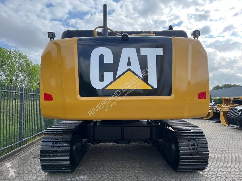 Rýpadlo Caterpillar UHD adjustable undercarriage
