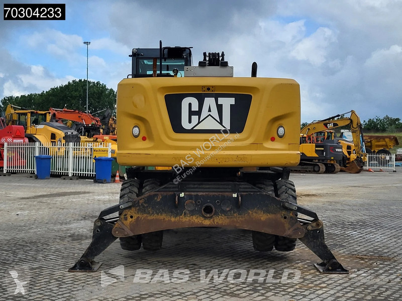 جرافة Caterpillar F F Outrigger + Blade