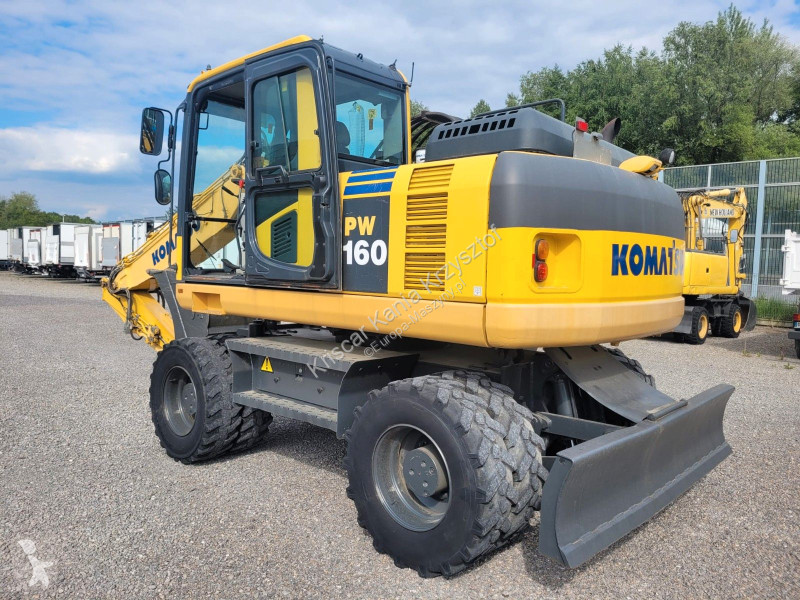 Lopatový nakládač Komatsu - 8 A/C 3 ARMS