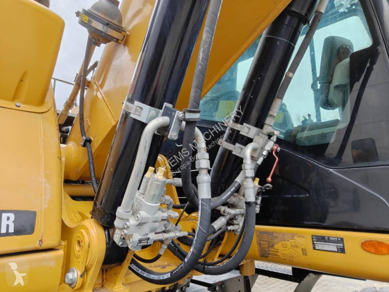 Escavatore Caterpillar M 318 D MH + GRAB