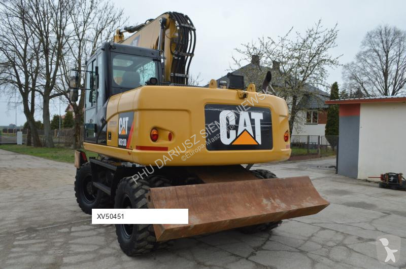 Lopatový nakládač Caterpillar 313